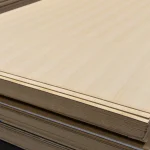 Corner of veneered MDF board with Sawn Ash Veneer white
