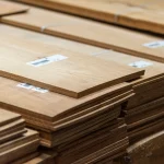 Ends of sawn acacia veneer pack showing 4.5 mm thickness