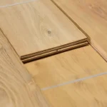 Close-up of sawn Acacia veneer sheet edges showing 2.5 mm thickness