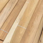 Natural wood grain pattern of sawn Acacia veneer sheets at an angle