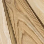 Close-up of the wood grain texture of sawn elm veneer
