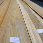 Sawn elm veneer sheets with barcode labels in the warehouse