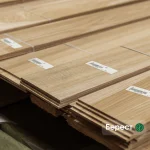 Sawn elm veneer sheets 4.5 mm thick stacked in packs