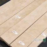 A pack of 2.5 mm sawn birch veneer sheets with barcode labels.