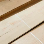 Surface of a sawn beech veneer bundle secured with a strap