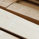 Pallets with bundles of sawn beech veneer in different shades