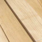 Close-up texture and natural grain of sawn beech veneer.