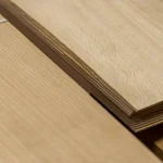 Detailed view of the cut and thickness of 2.5 mm sawn beech veneer.