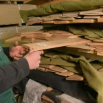 Selecting sawn beech veneer sheets at the WoodWay Expert warehouse.
