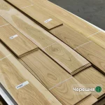 Sawn cherry veneer 2.5 mm thick in bundles at the warehouse