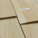 Side cut of sawn cherry veneer bundle showing 4.5 mm thickness