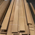 Bundles of sawn oak veneer ranging from 0.5 to 3 meters in length.