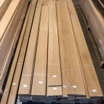 Long packs of sawn oak veneer prepared for shipment