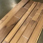 Bundles of sawn American Walnut veneer 2.5 mm stacked on a pallet