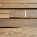 Surface of sawn American Walnut lamella with distinct wood grain