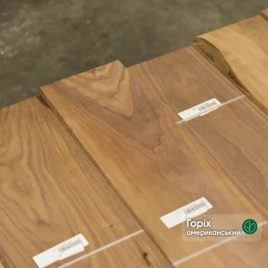 Sawn American Walnut veneer sheets 4.5 mm thick in labeled bundles.
