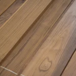 Close-up texture and natural grain of sawn American Walnut veneer.