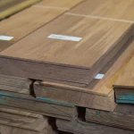 Ends of sawn American Walnut veneer bundles showing 4.5 mm thickness.