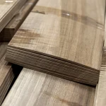 Edge of sawn European Walnut veneer stack showing 4.5 mm thickness