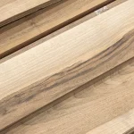 Close-up texture and grain pattern of sawn European Walnut veneer.