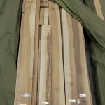 Long sheets of sawn European Walnut veneer laid out for inspection.