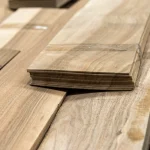 Ends of a sawn European Walnut veneer pack showing the 2.5 mm lamella thickness.