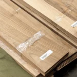 Marked pack of sawn European Walnut veneer with a label.