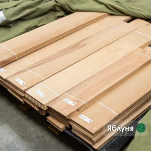 A pack of 2.5 mm sawn apple veneer in a warehouse