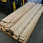 Pallet with bundles of sawn ash veneer in the warehouse