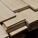 Ends of sawn ash veneer lamellas showing 4.5 mm thickness