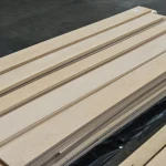 Stack of long sawn maple veneer sheets in the warehouse.