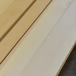 Natural texture and light cream tone of sawn maple veneer.