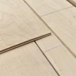 Close-up showing the 2.5 mm thickness of sawn maple veneer