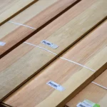 Texture of sawn pine veneer with barcode labels.