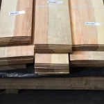 Warehouse pack of sawn pine veneer on a wooden pallet.