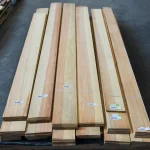 Long sheets of sawn pine veneer up to 3 meters long in the warehouse.
