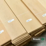 Packs of sawn alder veneer 2.5 mm thick in the warehouse