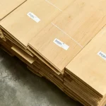 Packed bundles of sawn alder veneer with labels