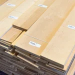 Pallet of sawn alder veneer packs 4.5 mm with barcodes at the warehouse.