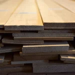 Ends of sawn alder veneer lamellas showing the 4.5 mm thickness.