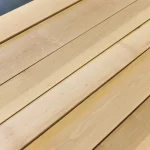 Several strips of sawn alder veneer laid out diagonally.