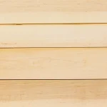 Smooth surface and natural wood tone of sawn alder veneer.