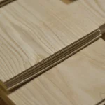 Edges of sawn ash veneer showing the 2.5 mm lamella thickness.