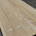 Laid out lamellas of sawn ash veneer 2.5 mm, top view.