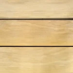 Texture of natural sliced Anegre veneer close-up