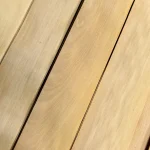 Surface of sliced Anegre veneer with a distinct wood pattern