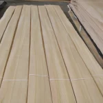 Sheets of natural sliced elm veneer 2.1 to 3.8 m long laid out on a table