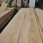 Sorting and inspection of sliced elm veneer at the WoodWay Expert warehouse