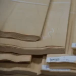 Edge view of natural sliced birch veneer sheets 0.6 mm thick in a bundle