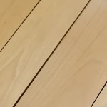Texture and natural grain pattern of sliced beech veneer.
